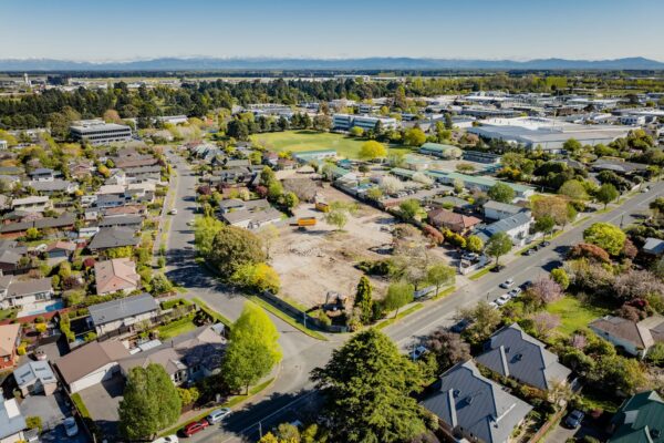 High-level aerial image of a suburban construction NZ site prepared for new build houses and modern house construction, part of a design and build programme for new build developments and residential refurbishment planning.