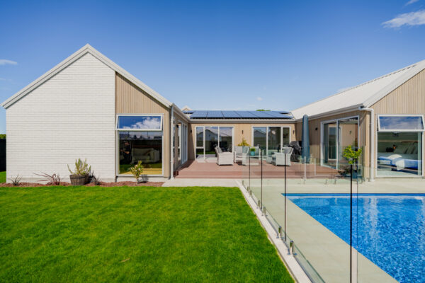 Rear exterior of a modern house within a new housing development, highlighting architectural homes and new build developments completed through full construction management.